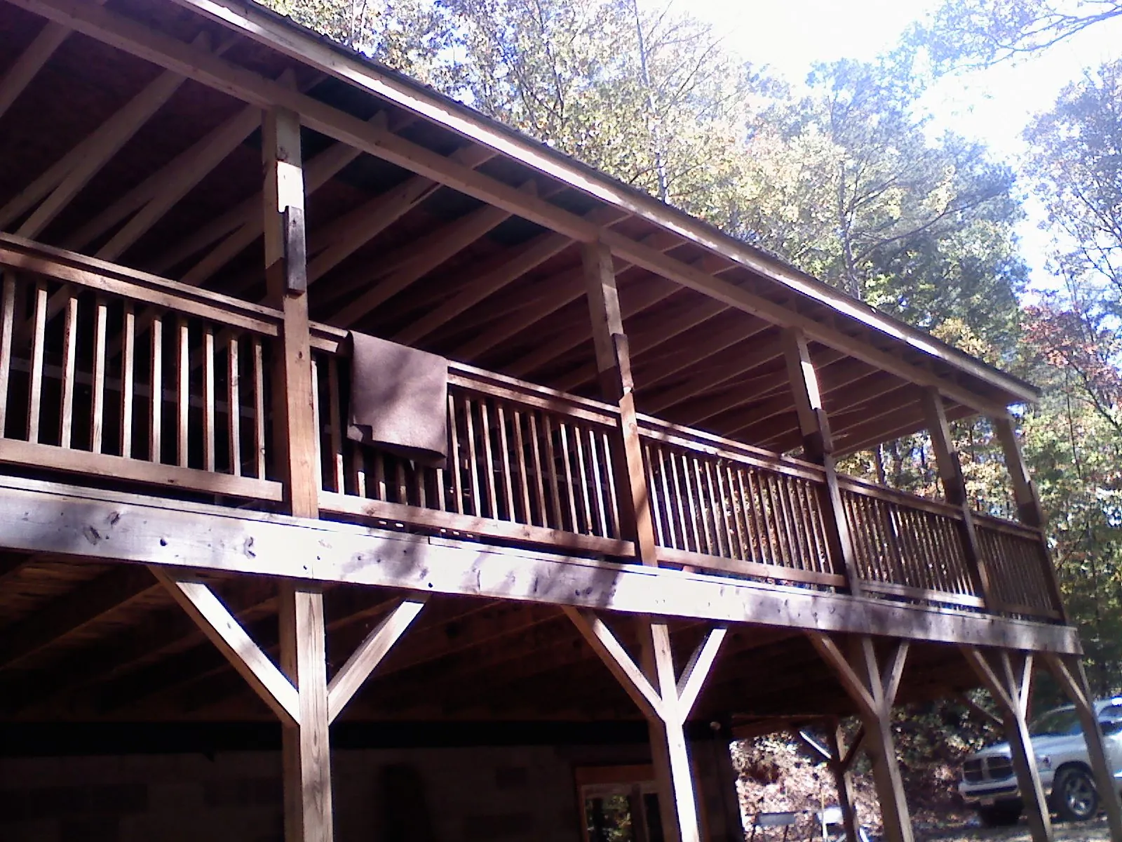 Timber framing under a new elevated porch and deck — Roof Leak Repair in Killingworth by Roofing Brothers